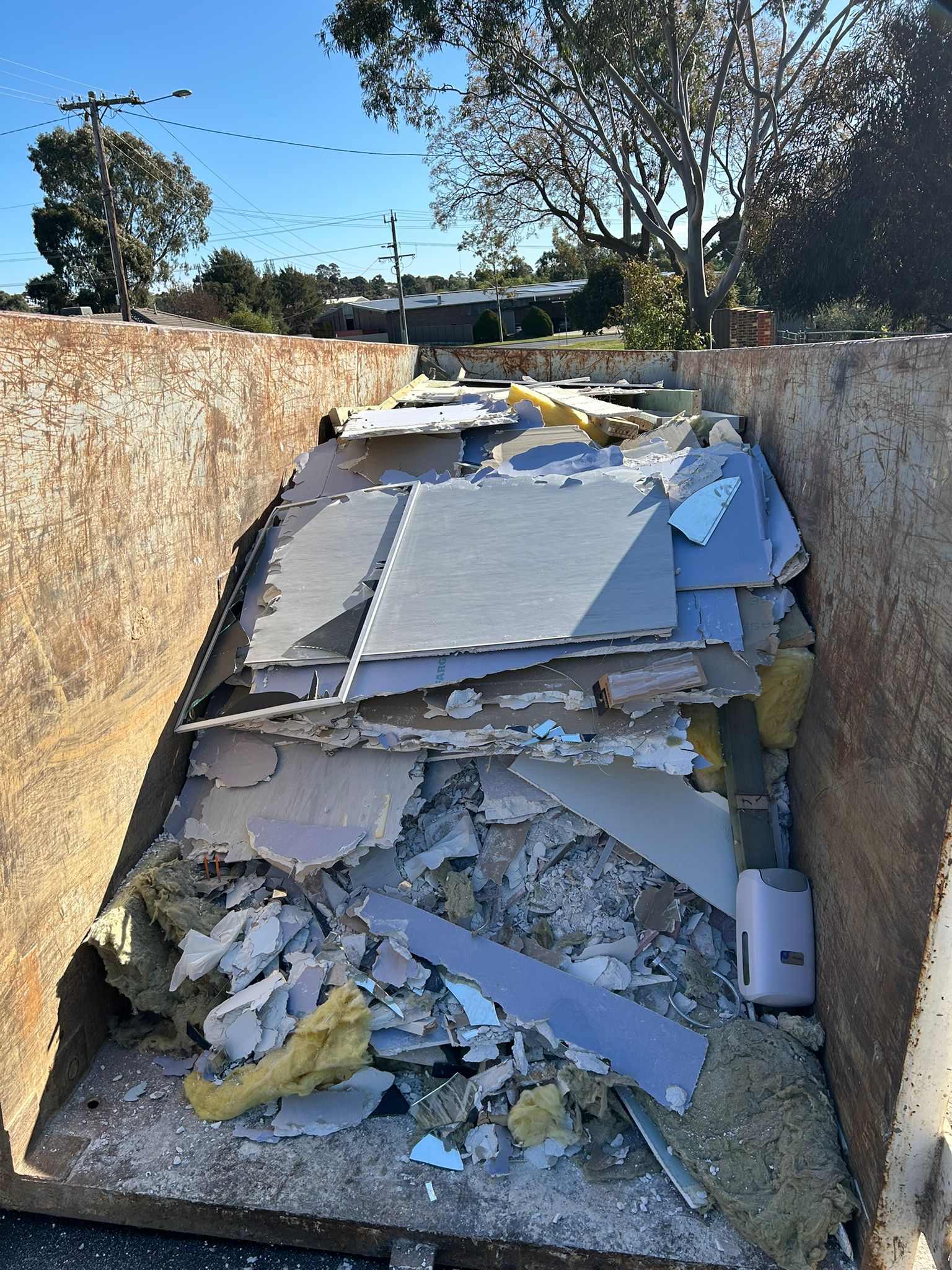 rubbish in bin for removal, waiting to be collected off the street